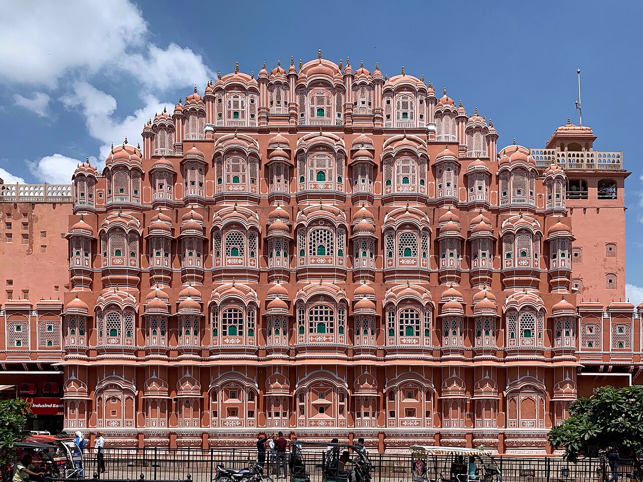 Pink sandstone façade with 953 jharokhas of Hawa Mahal Palace of Winds in Jaipur