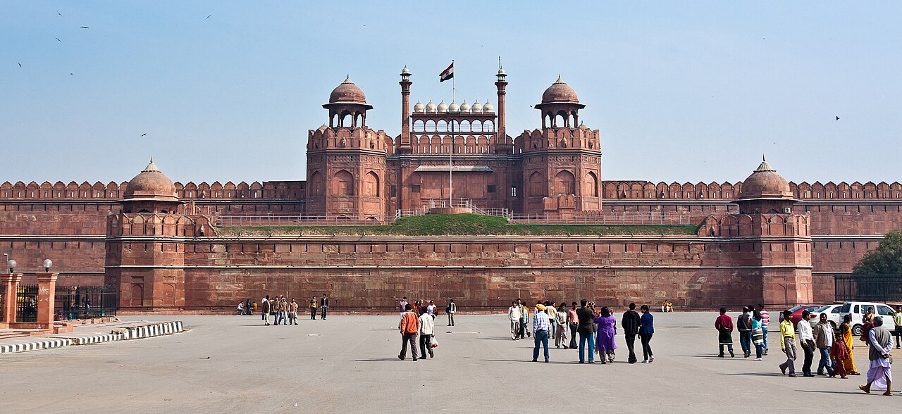 Massive red sandstone ramparts and Lahore Gate of the Red Fort in Old Delhi