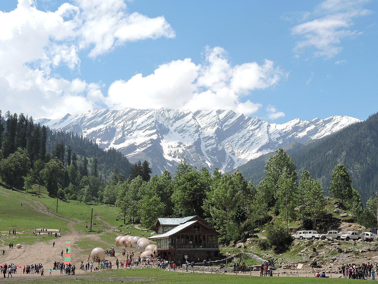 Snow-capped alpine meadows and pine forests of Solang Valley near Manali