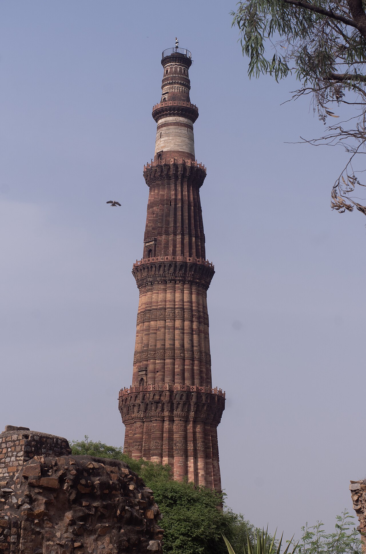 Towering Qutub Minar UNESCO World Heritage minaret in Delhi